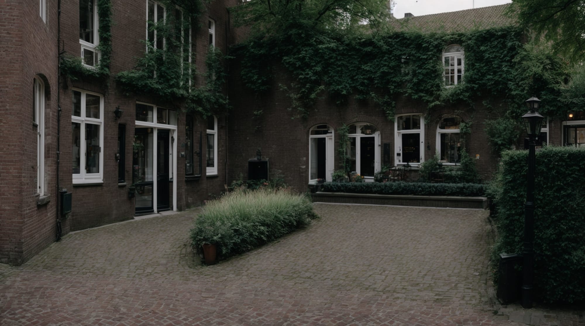 A quiet, hidden courtyard in Amsterdam, surrounded by historical buildings.