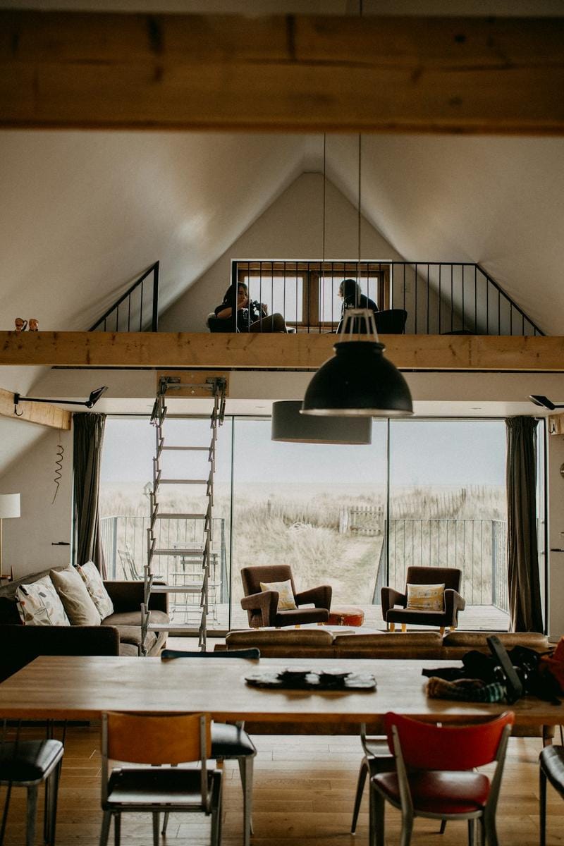 An interior shot of a cozy hotel room with modern decor and thoughtful amenities, highlighting comfort and convenience