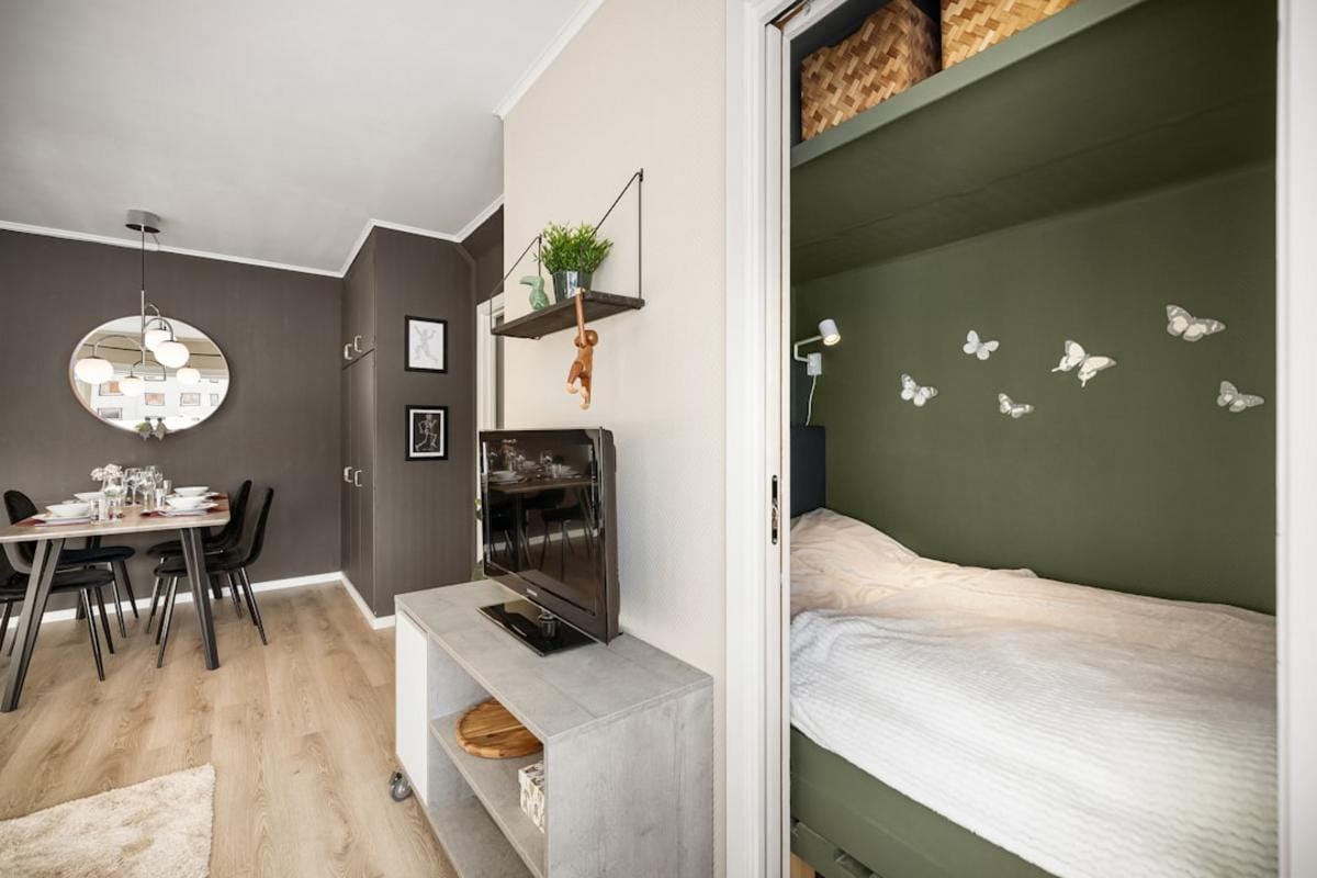 A cozy modern apartment with city views, showcasing a popular vacation rental option for travelers.